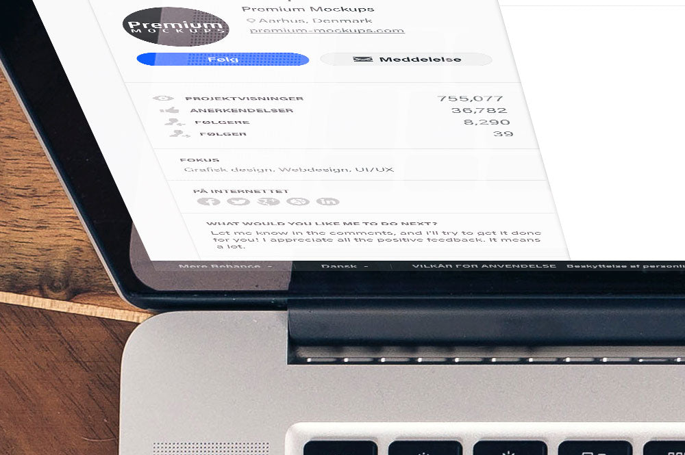 Free Woman Typing on a Macbook Pro Top View Mockup