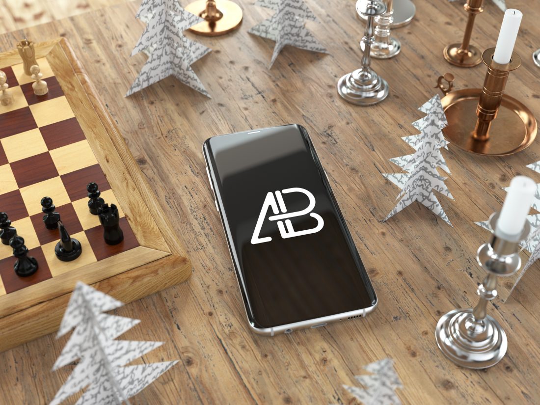 Free Samsung Galaxy S8 Plus Mockup PSD On Wooden Table