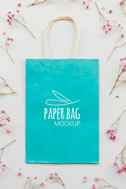 Free Above View Flowers And Paper Bag Assortment Psd