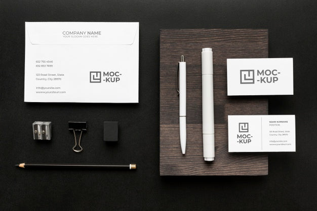 Free Arrangement Of Mock-Up Stationery On Wood Psd
