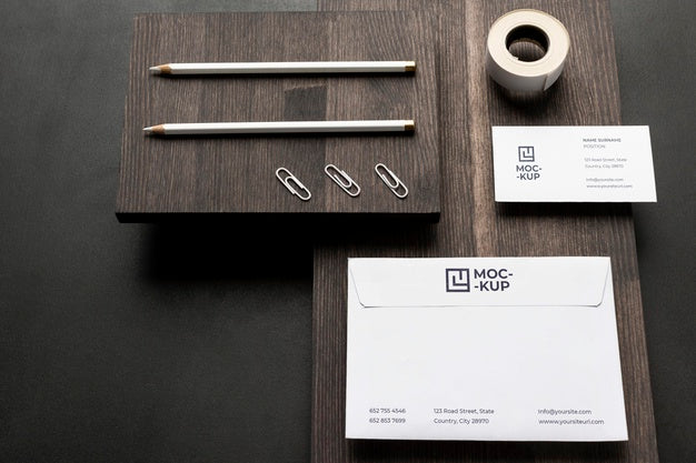 Free Arrangement Of Mock-Up Stationery On Wood Psd