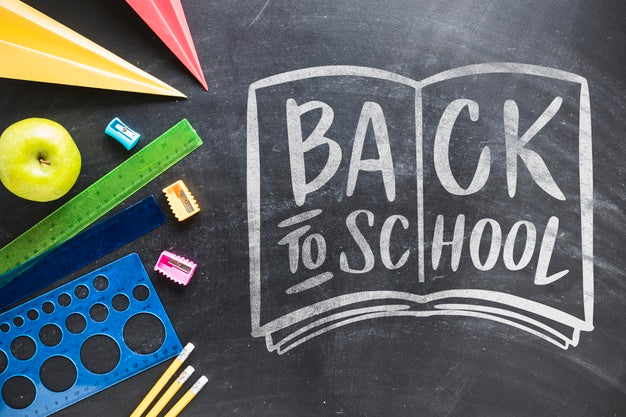 Free Arrangement With Supplies For School On Blackboard Psd