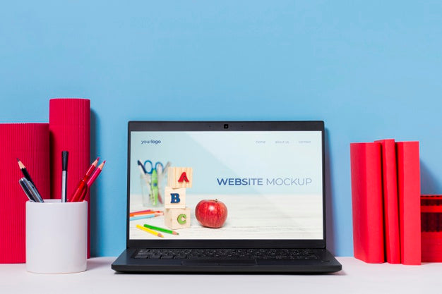 Free Assortment Of Pens And Laptop With Mock-Up Psd