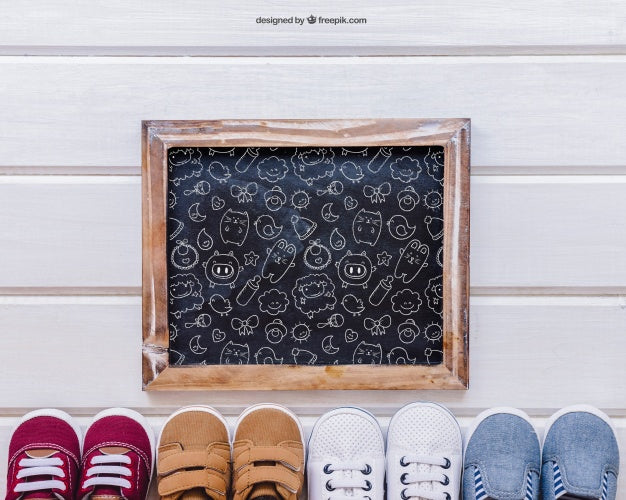 Free Baby Mockup With Slate And Shoes Below Psd