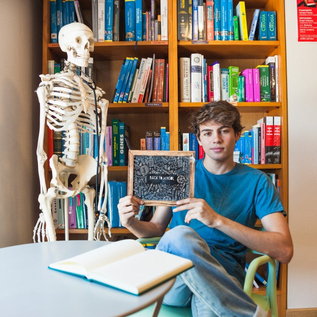 Free Back To School Concept With Boy Showing Slate Psd