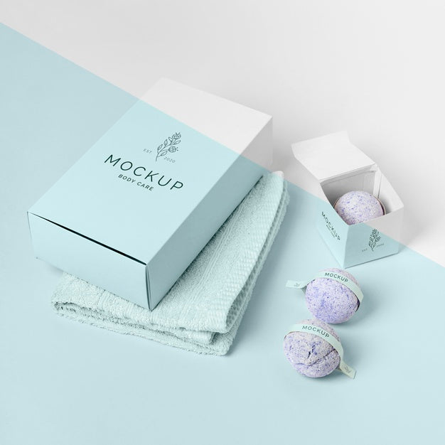 Free Bath Bombs, Boxes And Towel High Angle Psd