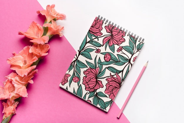 Free Beautiful Notebook Cover Mockup With Floral Decoration Psd