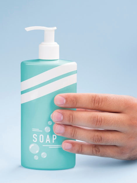 Free Blue Liquid Soap Bottle On Blue Background Psd