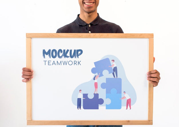 Free Business Man Holding Teamwork Mock-Up Psd