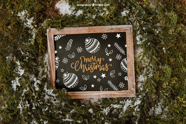 Free Christmas Mockup With Slate And Snow Psd