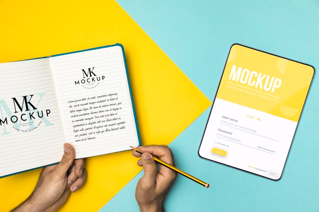 Free Close-Up Hands Holding Pencil And Notebook Psd