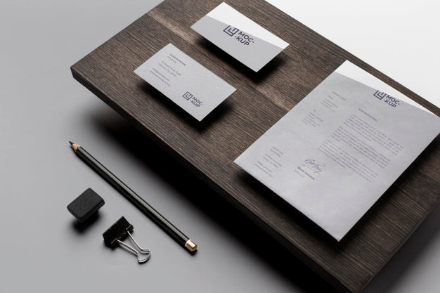 Free Composition Of Mock-Up Stationery On Wood Psd