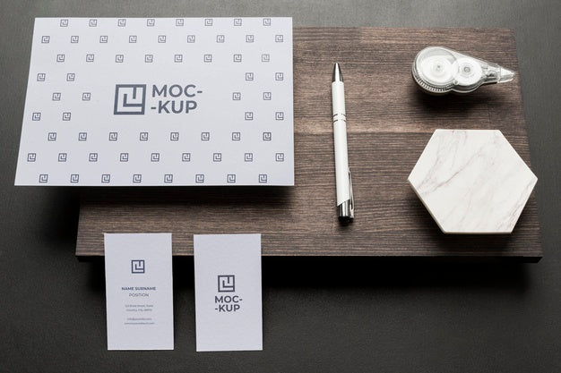 Free Composition Of Mock-Up Stationery On Wood Psd