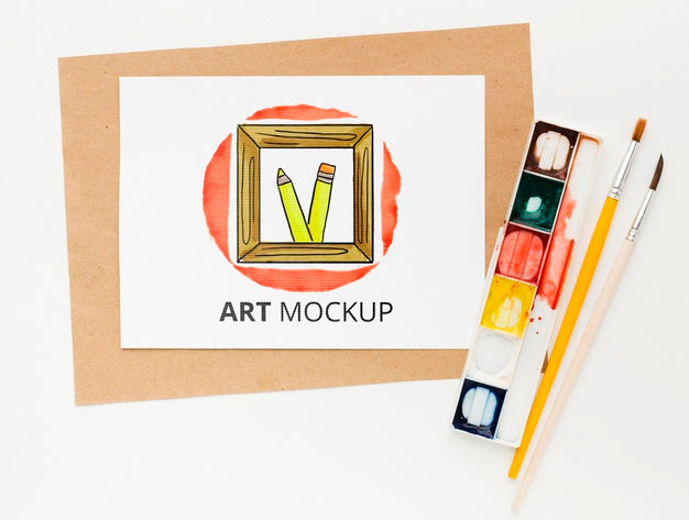 Free Flat Lay Artist Desk With Watercolors Psd