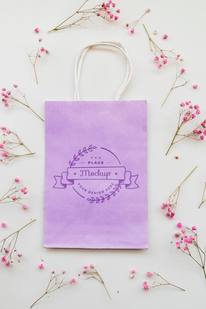 Free Flat Lay Flowers And Paper Bag Arrangement Psd