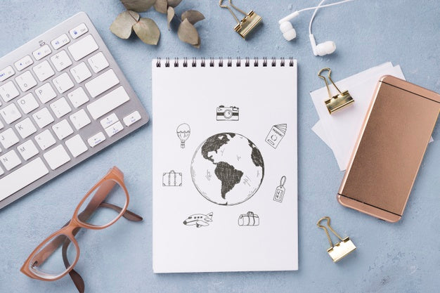 Free Flat Lay Notebook Mock-Up And Stationery Near Glasses And Keyboard Psd