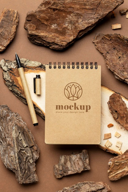 Free Flat Lay Of Paper Stationery With Pencils And Wood Psd