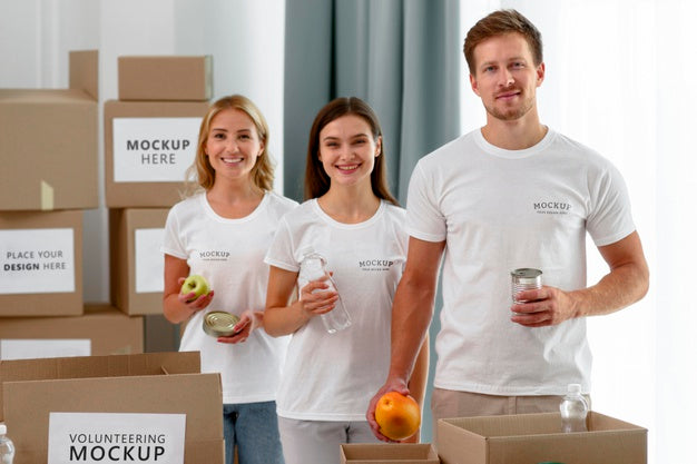 Free Front View Of Volunteers Holding Provisions For Donation Psd