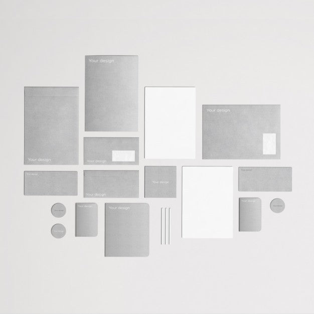 Free Grey And Stylish Corporative Stationery In Top View Psd