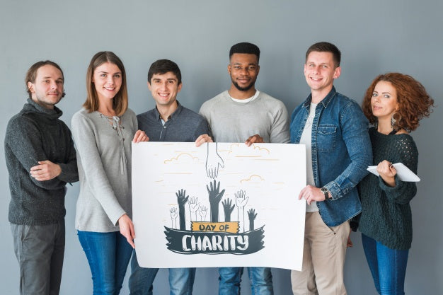 Free Group Of People Holding Placard Mockup For Charity Psd