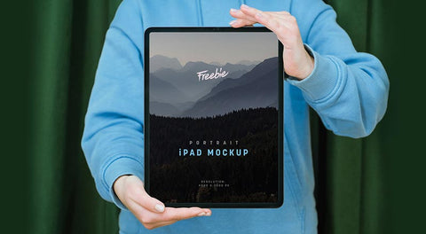 Free Hand Holding Ipad Pro Mockup Psd