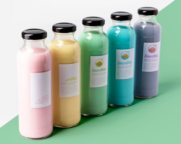 Free High Angle Of Assortment Of Juice Glass Bottles Psd