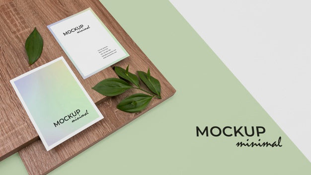 Free High Angle Stationery Mockup With Leaf Psd