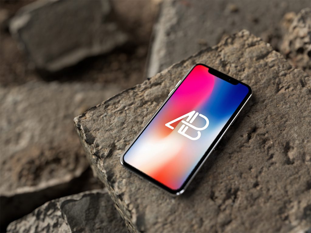 Free iPhone X on Outdoor Rocks Mockup
