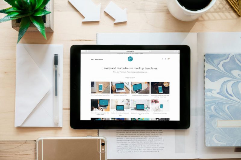 Free iPad Air With Envelope on Table Mockup Top View