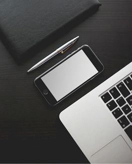 Free Iphone On A Black Wood Table