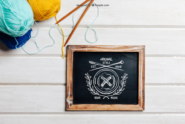 Free Knitting Concept With Slate And Sticks Psd