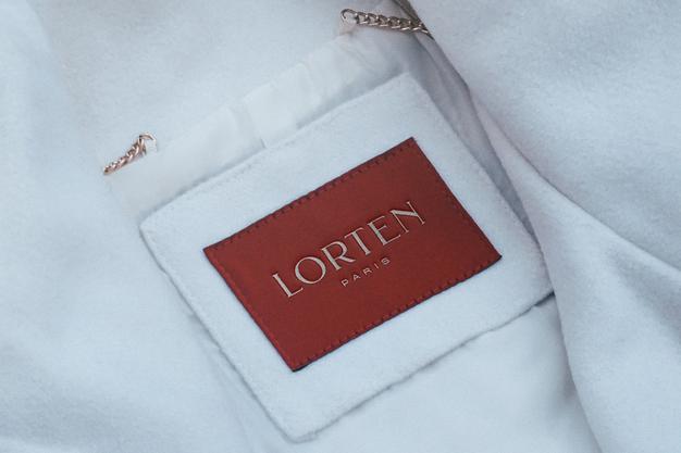 Free Logo Mockup White Coat Label Psd