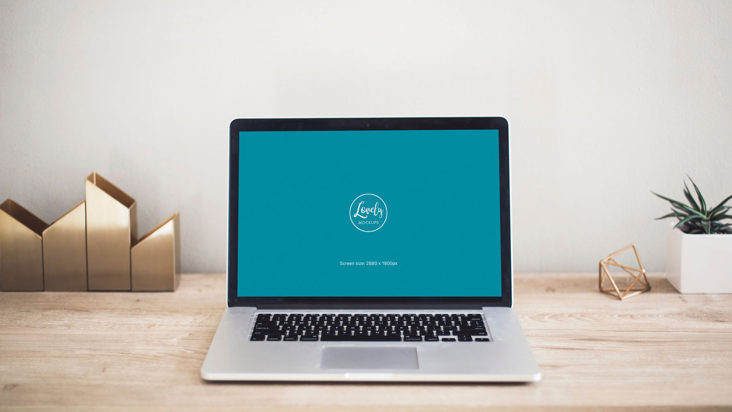 Free Macbook Pro 15" Mockup on Wooden Home Office Table