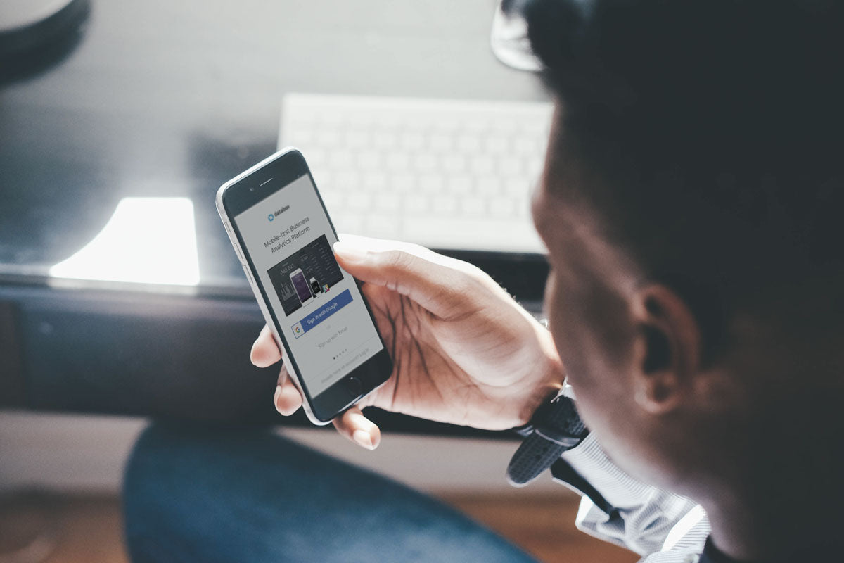 Free Man Viewing on Black iPhone 8 Screen PSD Mockup