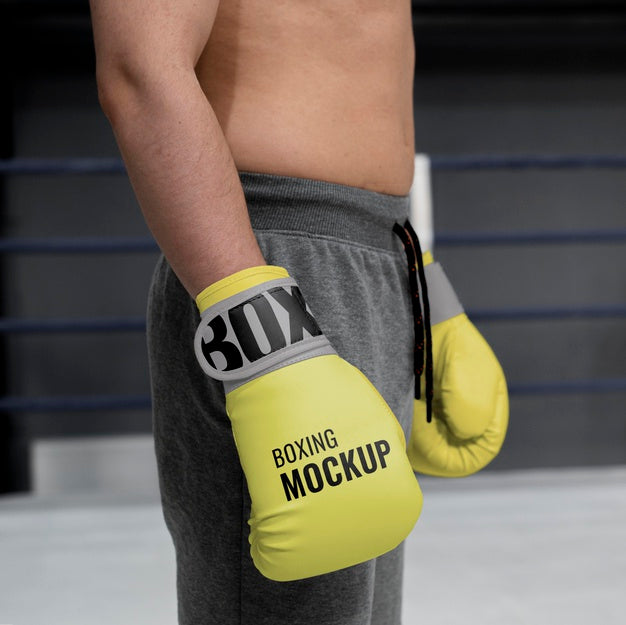 Free Man Wearing Boxing Gloves Mock-Up Psd