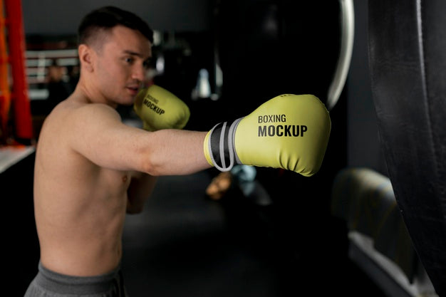 Free Man Wearing Boxing Gloves Mock-Up Psd