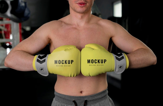 Free Man Wearing Boxing Gloves Mock-Up Psd