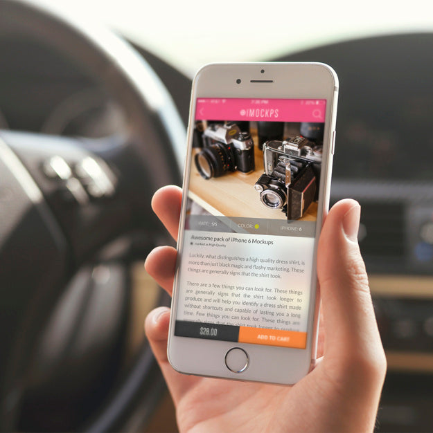 Free White iPhone 7 in a Hand with Changeable Screen Mockup