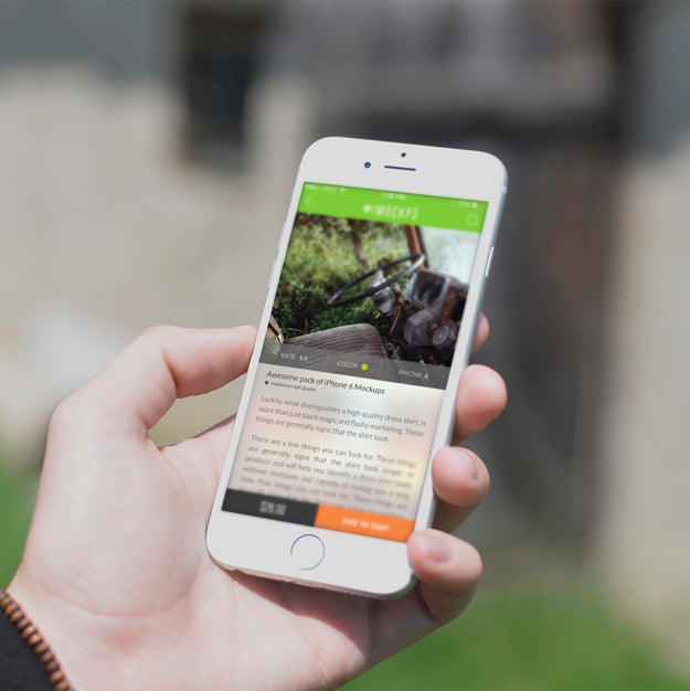 Free White iPhone 7 Mockup Outdoors in a Hand