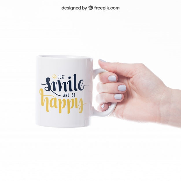 Free Coffee Mug Mockup in a Hand