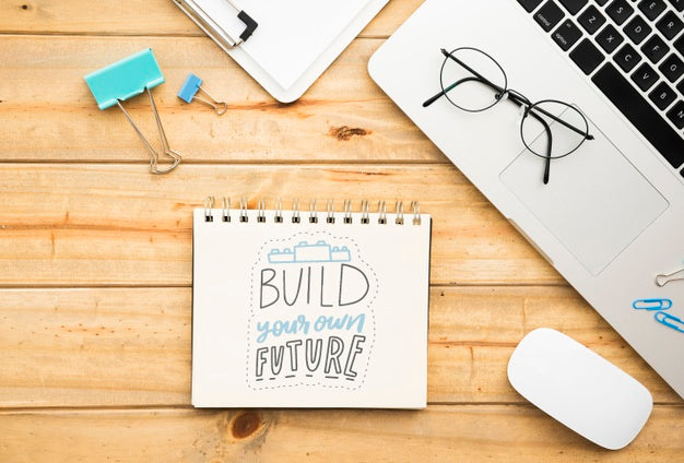 Free Notebook On Desk With Positive Message Psd