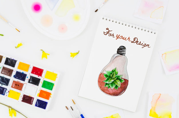 Free Notebook With Realistic Draw And Acrylic Pallette Beside Psd