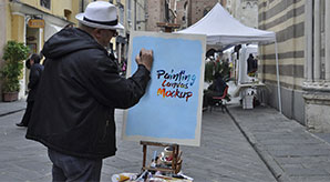 Free Painter Painting On Canvas Mockup Psd