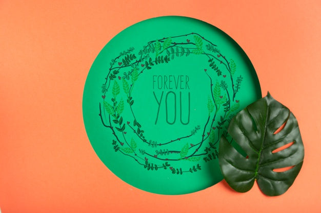 Free Paper Shape With Realistic Leaf Beside Psd