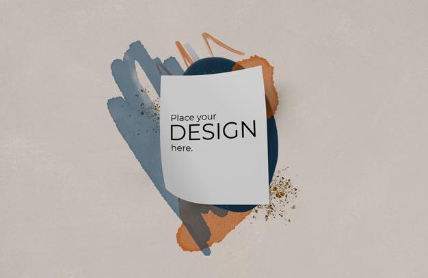 Free Paper Sheet Mockup Over Watercolor Stain Psd