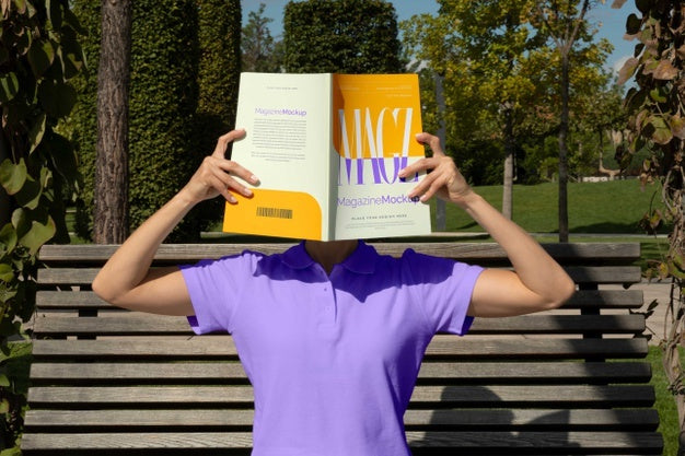Free Person Reading Color Pop Magazine With Cover Mockup Psd