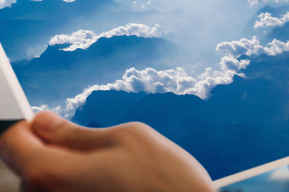 Free Man Holding a Photography or Printing Photo Mockup