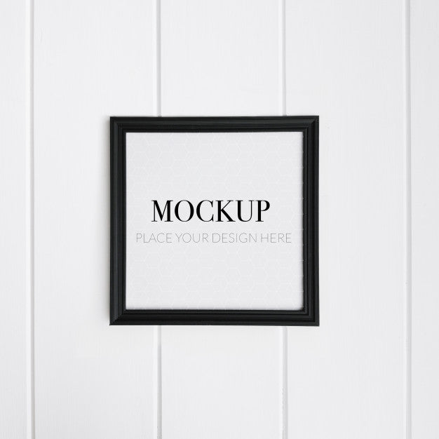 Free Realistic Black Frame On White Wall For Mockup Psd
