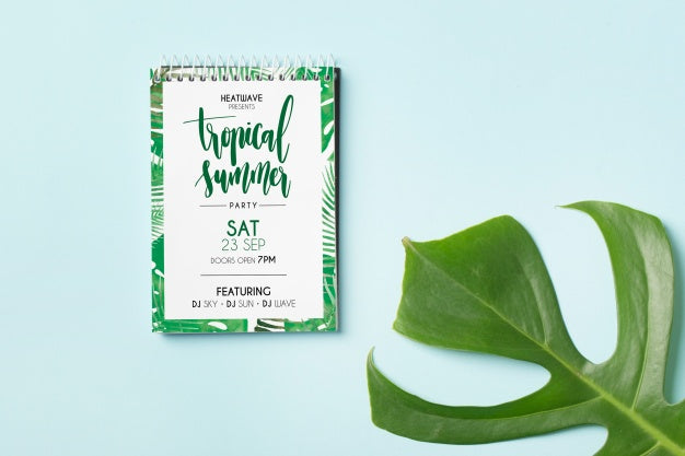 Free Spiral Notepad Mockup With Palm Leaf Psd