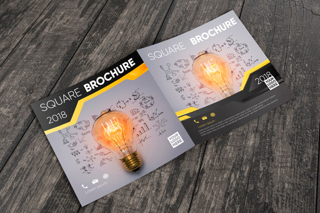 Free Square Brochure Mockup On Wooden Surface Psd